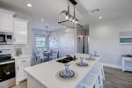 Modern upscale kitchen with Quartz counters and soft touch cabinets
